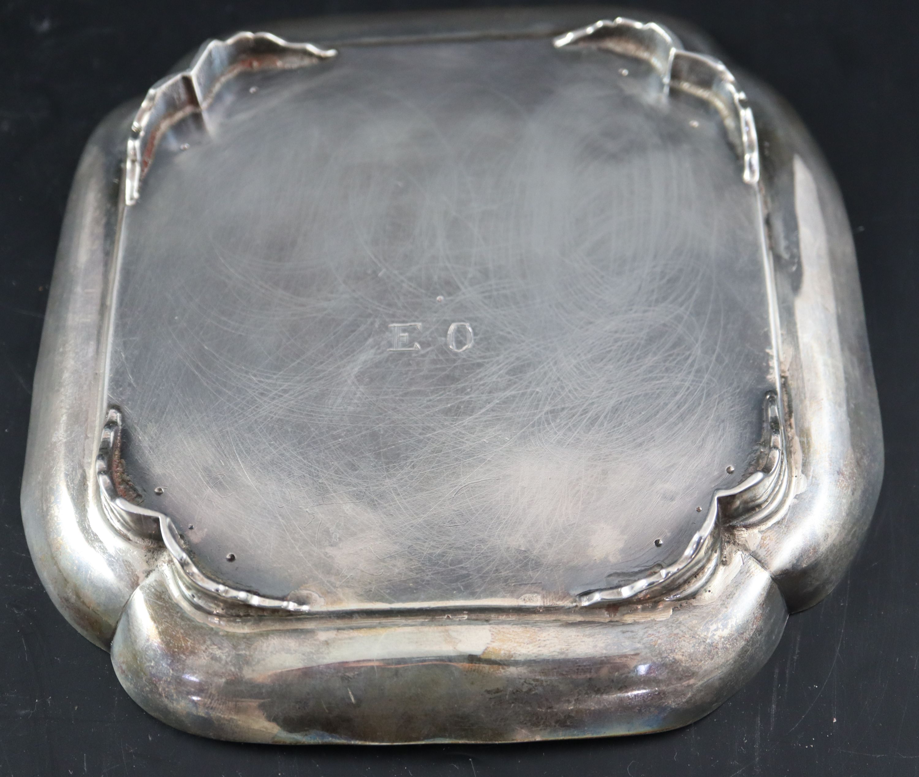 A George III silver shaped square waiter or stand, 14.7cm, 5oz.